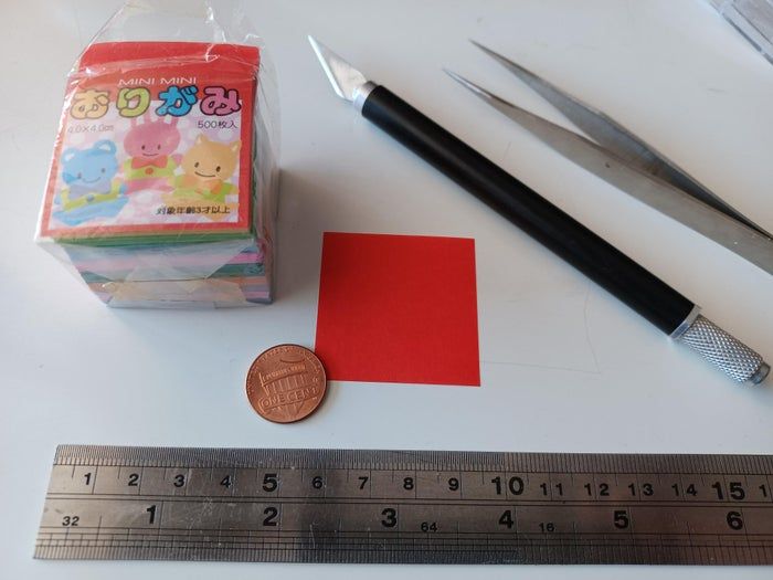 挑战手工极限:用4x4厘米纸折迷你千纸鹤教程-第3张图片-趣作屋 挑战手工极限:用4x4厘米纸折迷你千纸鹤教程-第3张图片-趣作屋