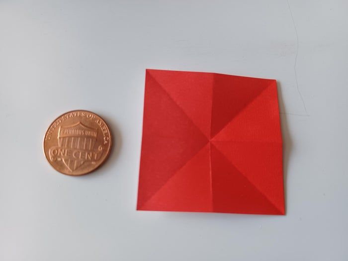 挑战手工极限:用4x4厘米纸折迷你千纸鹤教程-第4张图片-趣作屋 挑战手工极限:用4x4厘米纸折迷你千纸鹤教程-第4张图片-趣作屋