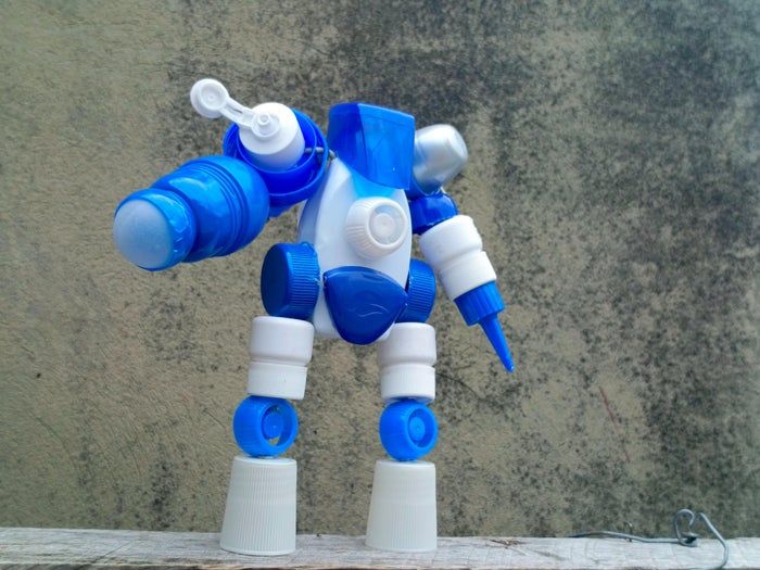 用回收塑料瓶盖制作创意机器人玩具-第3张图片-趣作屋
