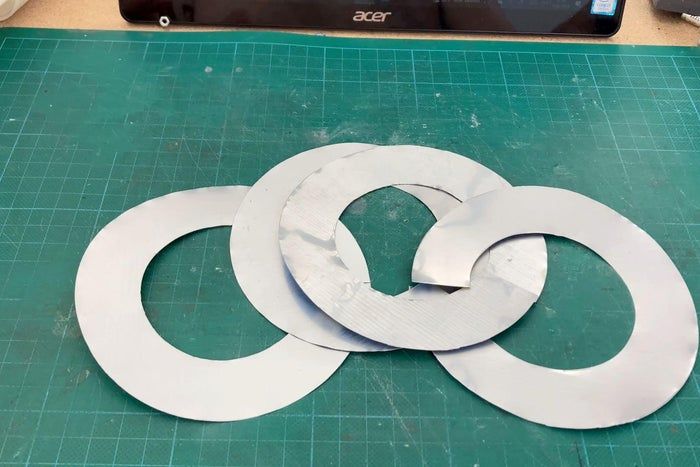 用饮料罐制作户外风动螺旋装饰教程-第10张图片-趣作屋 用饮料罐制作户外风动螺旋装饰教程-第10张图片-趣作屋